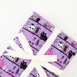 A Drop Of Magic Quilted Children's Bamboo Blanket - Purple 13 A Drop Of Magic Quilted Children's Bamboo Blanket - Purple -DREAMIERE Store purpleshelfquiltedblanket 2